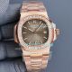 Swiss Replica Patek Philippe Nautilus 5711 Rose Gold Watch White Dial Diamond Bezel (2)_th.jpg